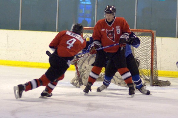 Devils Captain Hamish Lewis screens the goalie while Lukas Kavka lets one go